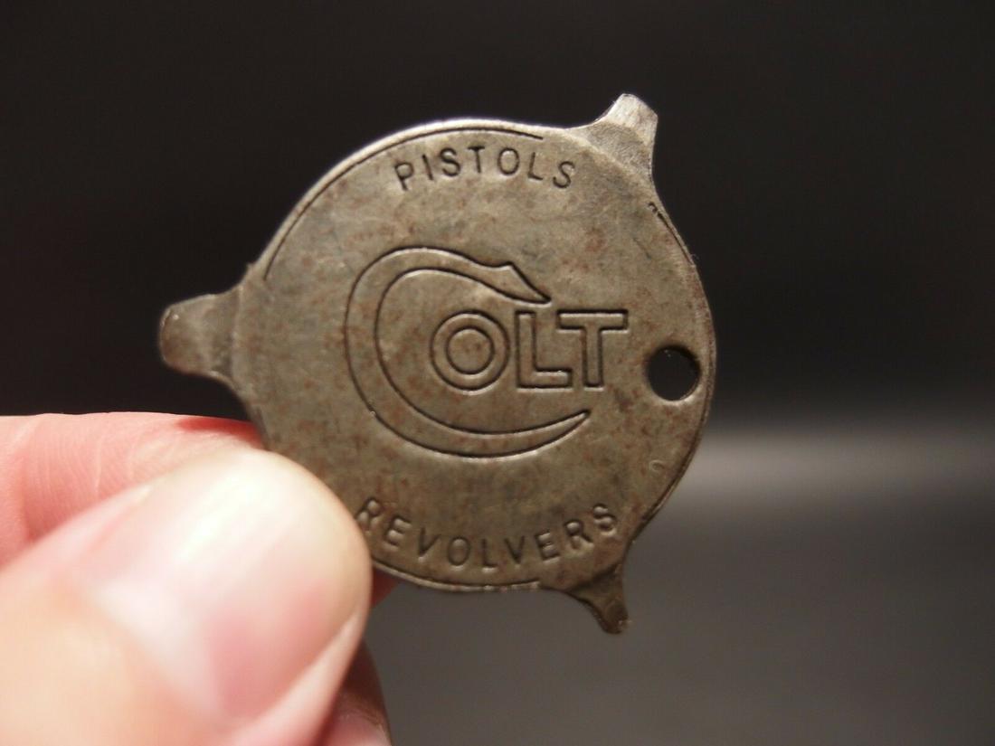 Colt Firearms Screw Driver Key chain: 1 1/2" at its widest Nice Reproduction Colt advertising screwdriver. Great for a key ring comes in handy! Reserve: $15.00 Shipping: Domestic: Flat-rate of $6.00 to anywhere within the contiguous U.S. 