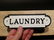 Cast Iron Laundry Sign