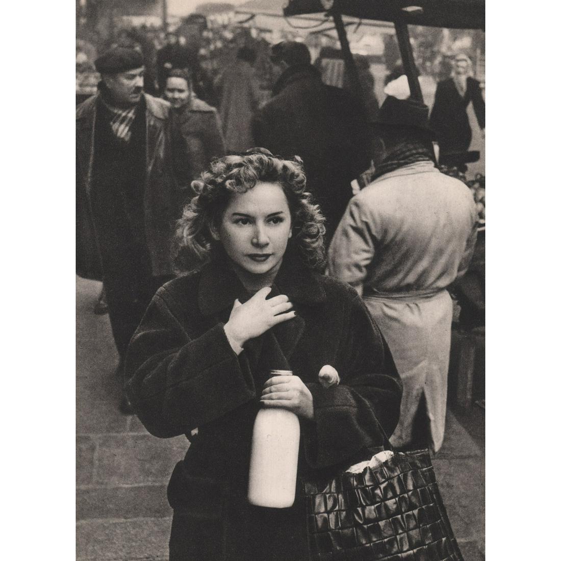 ROBERT DOISNEAU - Paris Market: Artist: ROBERT DOISNEAU Print Title: Paris Market Medium: Sheet-fed Gravure Printing Date: 1950's Printed in France Image Size approx: 10 x 7.5 inches Robert Doisneau (1912-1994) was a French photogra