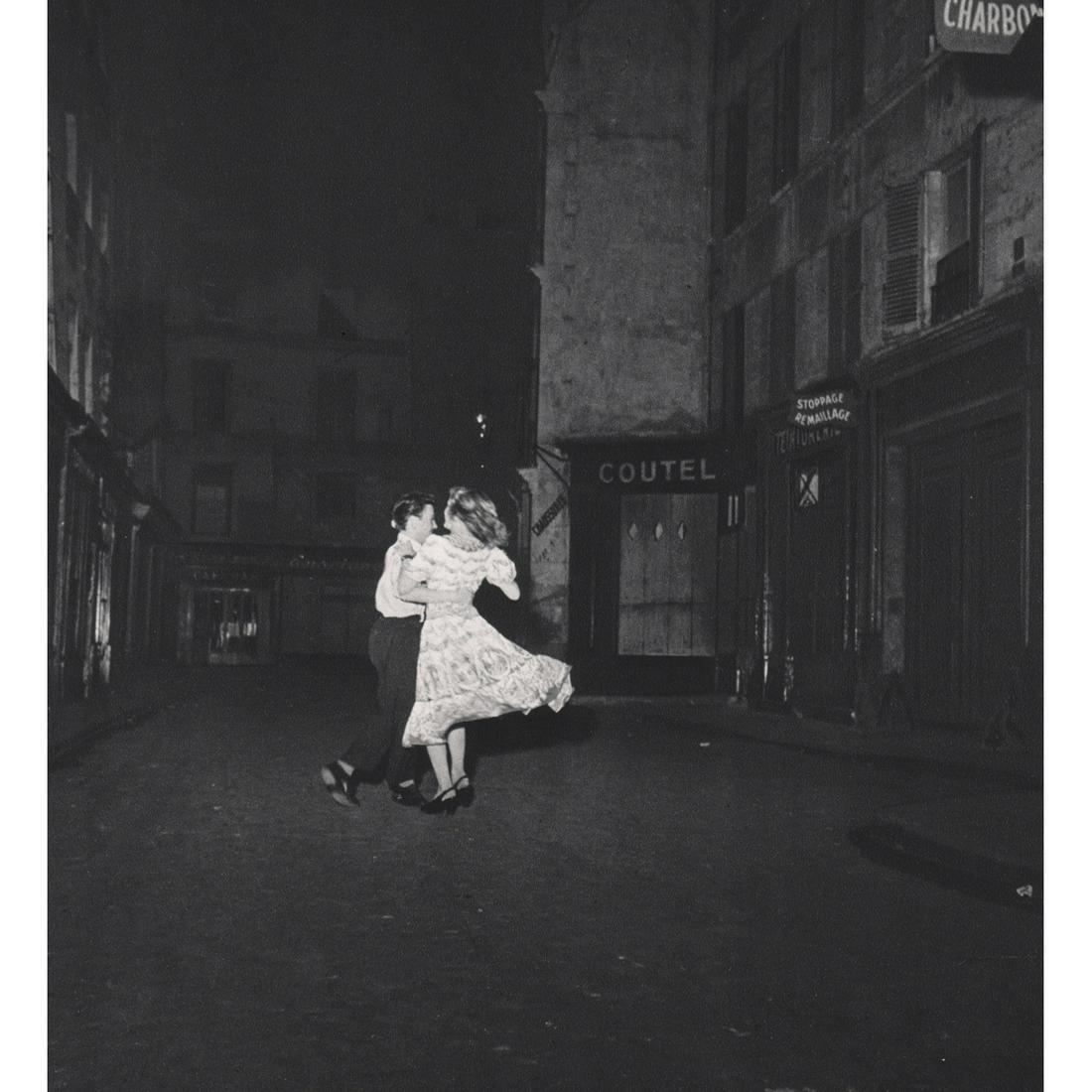 ROBERT DOISNEAU - Waltzing on Bastille Day, 1949: Artist: ROBERT DOISNEAU Print Title: Waltzing on Bastille Day, 1949 Medium: Sheet-fed Gravure Printing Date: 1970's Printed in France Image Size approx: 7.5 x 7 inches Robert Doisneau (1912-1994) was