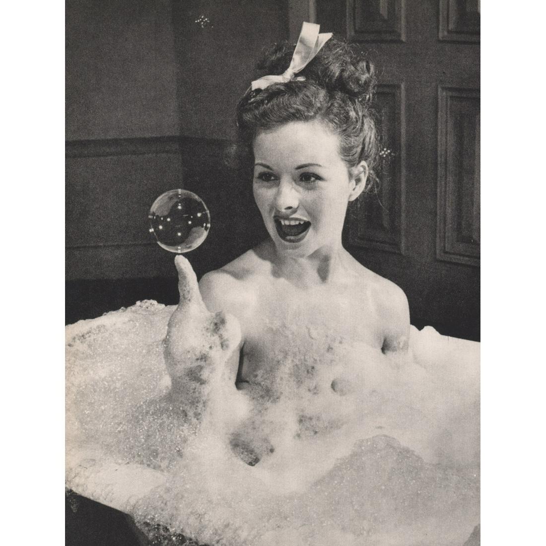 PETER STACKPOLE - Bubble Bath: Artist: PETER STACKPOLE Print Title: Bubble Bath Medium: Sheet-fed Gravure Printing Date: 1960's Printed in Japan Image Size: 9.75 x 7.5 inches Peter Stackpole (1913-1997) was an American photographer