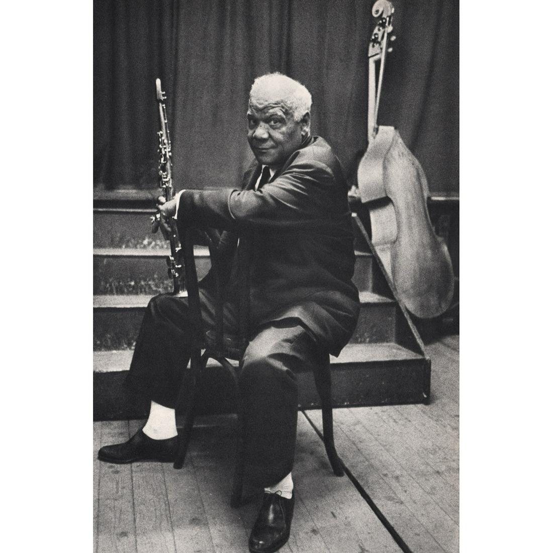 DENNIS STOCK - Sidney Bechet: Artist: DENNIS STOCK Print Title: Sidney Bechet Medium: Sheet-fed Gravure Printing Date: 1950's Printed in Switzerland Image Size approx: 11 X 7 inches Dennis Stock (1928-2010) was an American journal
