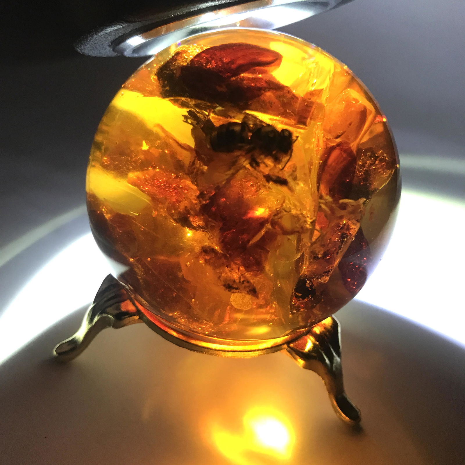 Stunning Vintage Amber Ball with inclusion on a (1 of 9)