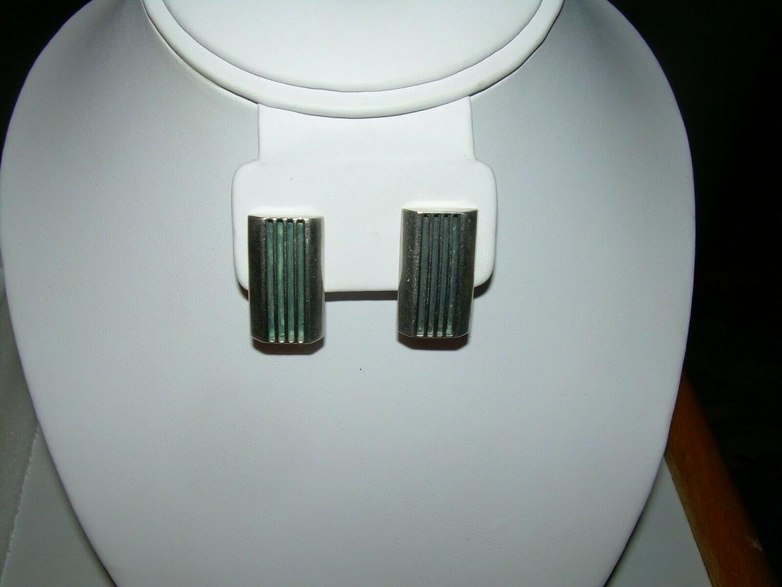 Sterling Southwestern Stud Pierced Earrings;: Vintage sterling silver pierced stud earrings come in a turquoise enameled bar accent design. The earrings are slightly curved or dome shaped in the front. The earrings are 1" long and 5/8" wide. The 