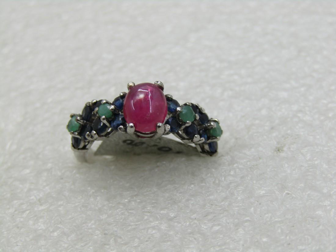 Sterling Silver Emerald and Ruby Ring: Sterling Silver Emerald and Ruby Ring, Sz. 7 Reserve: $15.00 Shipping: Domestic: Flat-rate of $4.00 to anywhere within the contiguous U.S. International: Foreign shipping rates are determined by desti