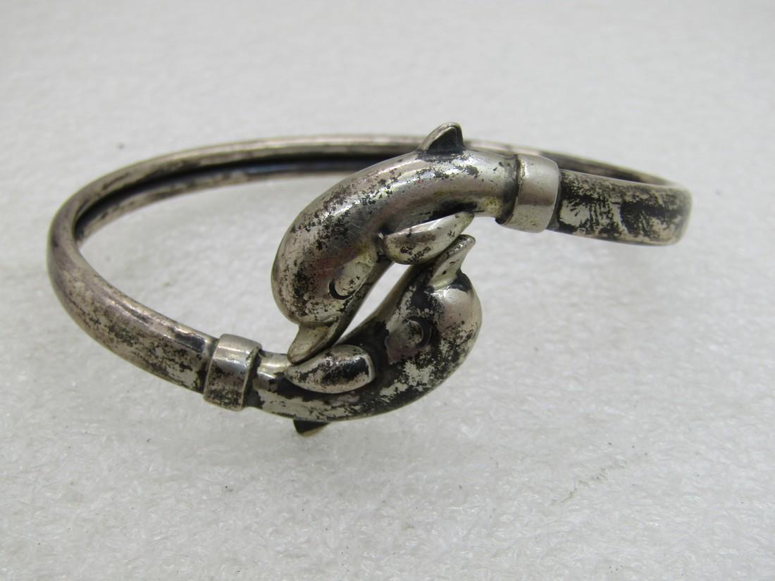 Vintage Sterling Silver Bypass Dolphins Bracelet: Vintage Sterling Silver Bypass Dolphins Bracelet, 7" Reserve: $35.00 Shipping: Domestic: Flat-rate of $4.00 to anywhere within the contiguous U.S. International: Foreign shipping rates are determined 