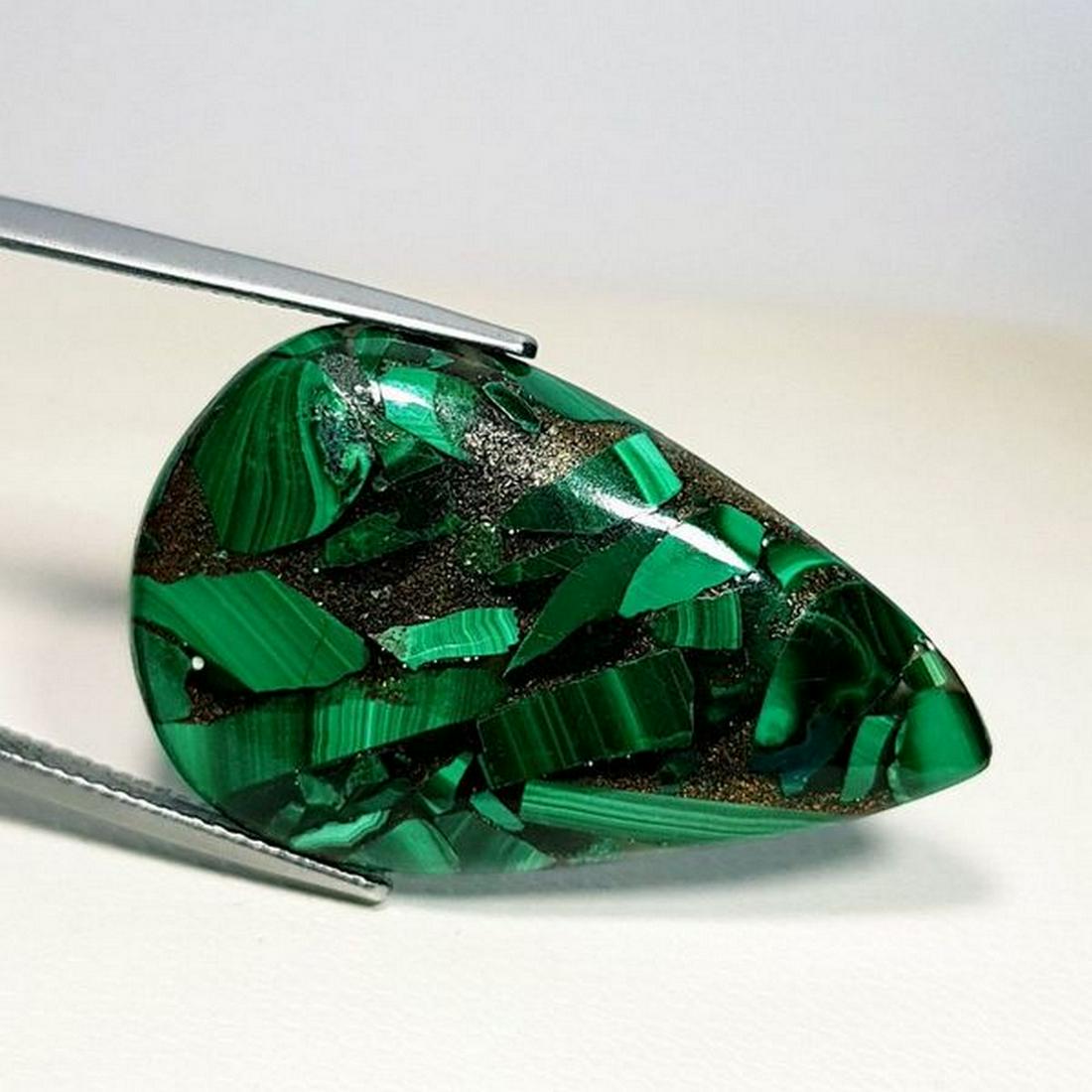 26.90 ct Natural Malachite: No Reserve! Title: 26.90 ct Natural Malachite Color/Clarity: Opaque Gemstones: Gemstones Carat Weights: 26.9 Size/Dimensions: 33.00 x 20.50 x 4.85 Additional Information: Pear - Africa Shipping: Worl