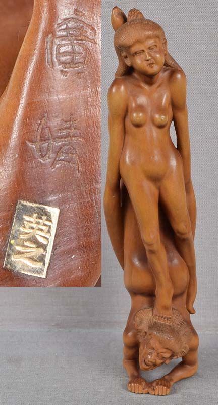 Netsuke male & female ASHINAGA & TENAGA by HIDEYUKI: Very unusual tall boxwood netsuke of a rather acrobatic male Ashinaga (long legs) standing on his elbows with his feet up as an unusual female Tenaga (long arms) stands on the back of his head. Superb