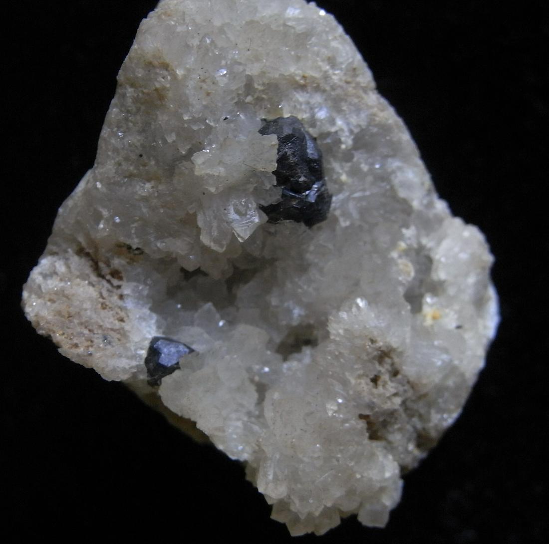 SPHALERITE & QUARTZ: Title: SPHALERITE & QUARTZ Origin: Jose Maestre Tunnel, Portman, La Union, Murcia, Spain Size: 2x2x2 cm / 20 gram Description: complex black sphalerite crystal on druzy quartz over matrix Reserve: $7.
