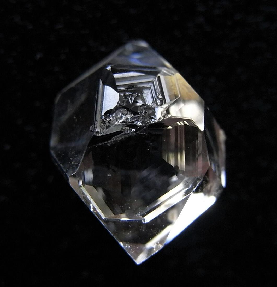 GENUINE HERKIMER DIAMOND: Title: GENUINE HERKIMER DIAMOND Origin: Ace of Diamonds Mine, Middleville ,New York, USA Size: 1.15x0.9x0.7 cm / 0.99 gram Description: extremely clear quartz var herkimer diamond with hoppered areas 