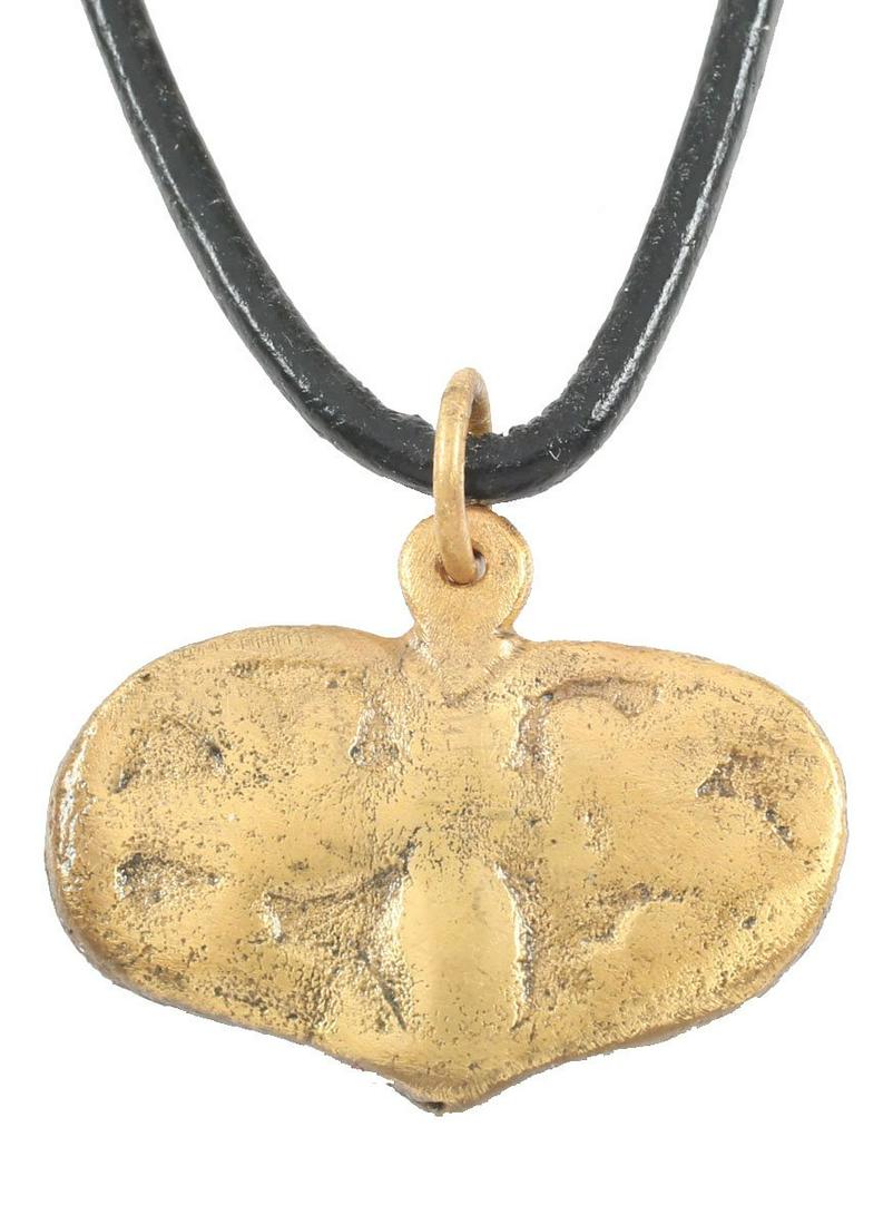 VIKING HEART PENDANT NECKLACE C.10TH-11TH CENTURY AD: Large example over 1” width of broad form with raised edges sprouting trefoil motifs which fill the field. The trefoil (triple leaf) motif was popular with Vikings and believed to represent fertilit