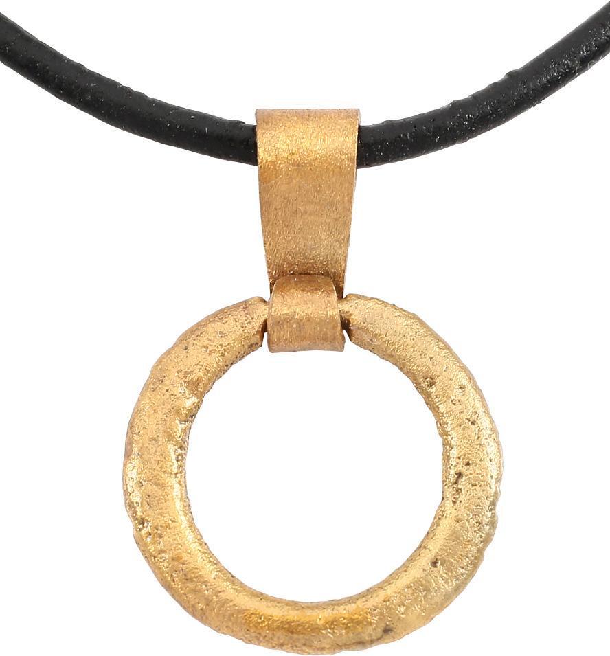 VIKING PROTECTIVE BROOCH PENDANT 10th CENTURY: Circular bronze, Just under 7/8” diameter with rounded front and flat back forming a ridged edge. The surface with light texture from burial. Professionally conserved and the gold surface restored. 