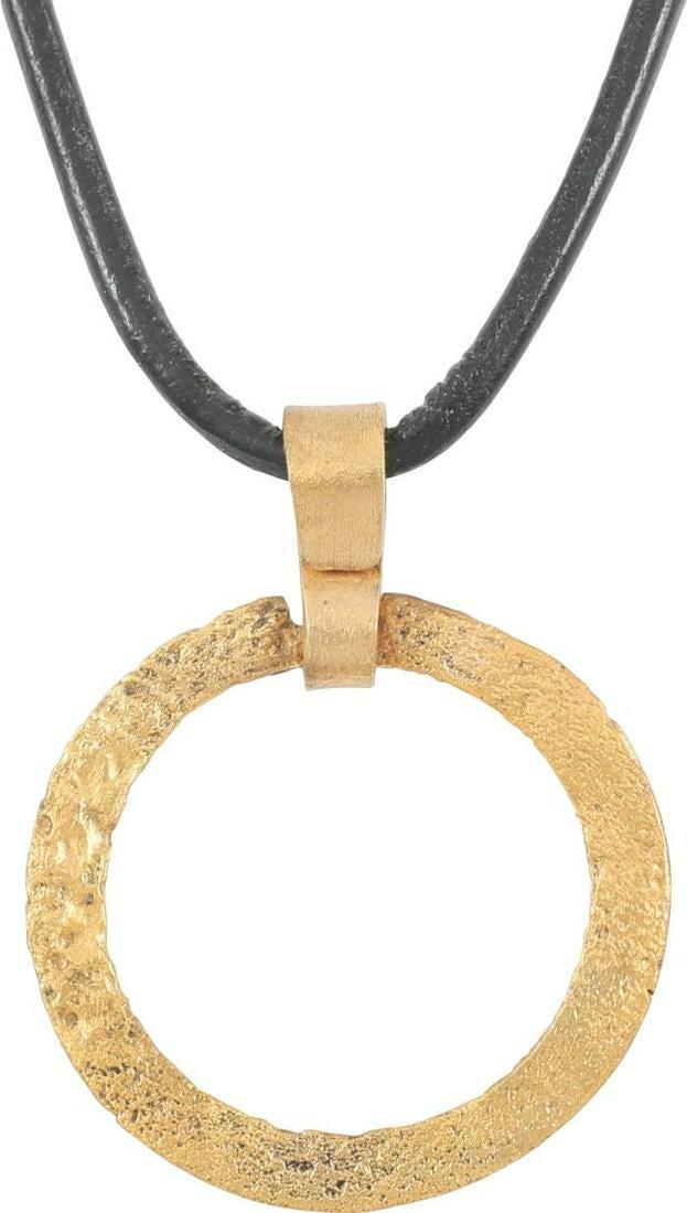 VIKING PROTECTIVE BROOCH, 10th-11th CENTURY.: Bronze, just over 1Â” diameter. Broad flat form. Heavily textured from burial. Worn in numbers, these were decorative as well as serving as a measure of protection from sword blows. See multiple im