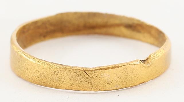 VIKING WEDDING RING LATE 9th-11th CENTURY AD.: Gilt bronze, size 3. 2.8mm width band with a slightly rounded face. Sized for the small finger as was the custom in some areas. Vikings exchanged rings on the pommel of the groomÂ’s sword. Professi