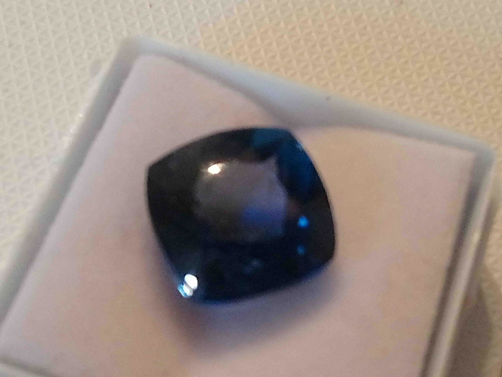 Tanzanite: Title: Tanzanite Color/Clarity: blue/VVS Gemstone Type: man made Carat Weights: 10.33 Size/Dimensions:11.55x11.34x7.36 Additional Info:Please ,note that the item may be shipped without tracking number