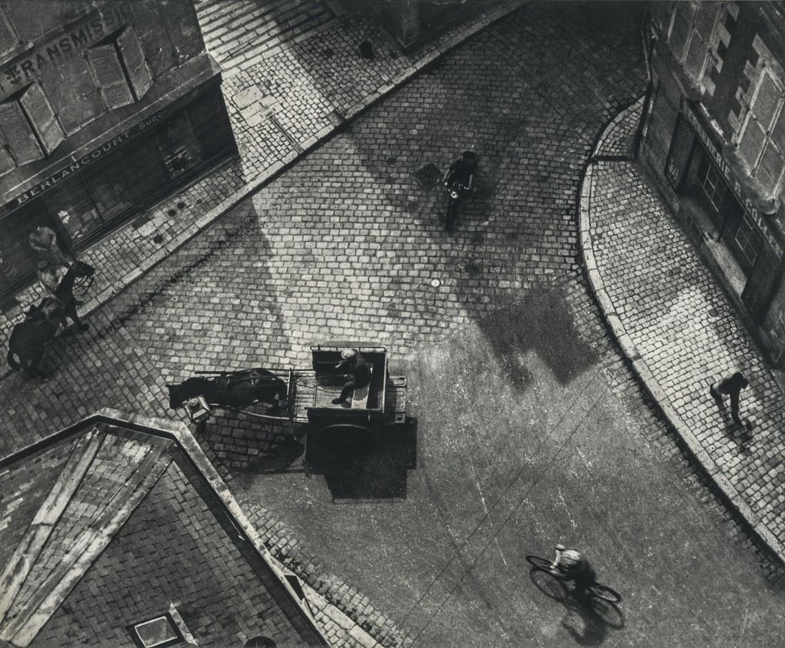 Andre Kertesz, Carrefour (The Corner), 1930: Artist: Andre Kertesz Title: Carrefour (The Corner), 1930 Medium: Sheet Fed Gravure, 1972, USA Dimensions: 9.45x7.8" Additional Information: Heat Wax Mounted on 11x14" Conservation Board Artist Bio: A