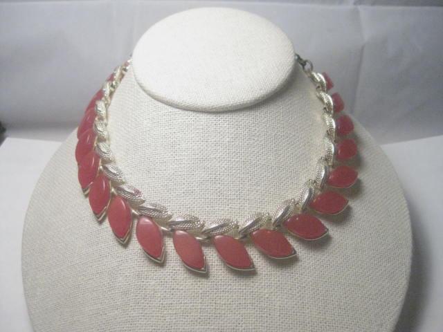 Vintage Red Thermoset Choker Necklace, 1950's-1960's,: Vintage Gold Tone Red Cateye Shaped Thermoset Choker/Necklace. 1950's through 1960's - hot red. There are 19 red stones set on an angle on a gold tone base with gold tone wispy textured leaf-like acce