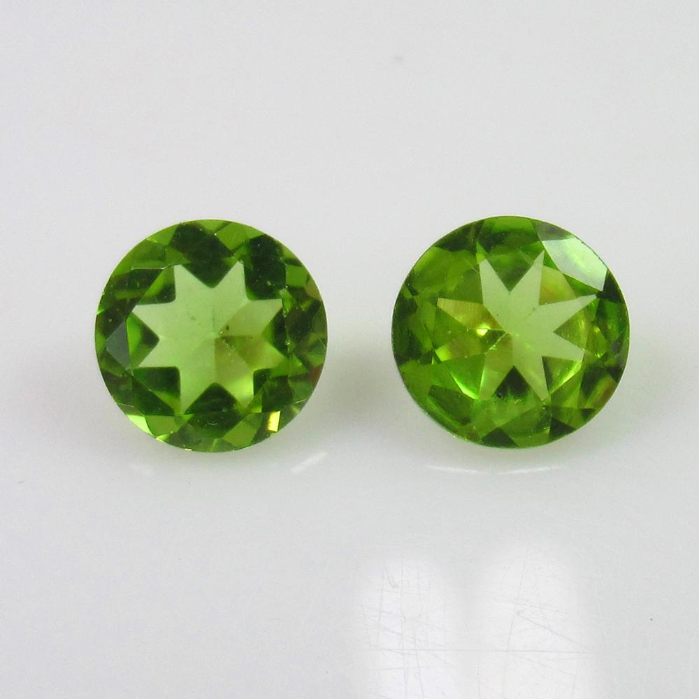 2.51 Ctw Natural Pakistan Peridot Round Pair: No Reserve! Title: 2.51 Ctw Natural Pakistan Peridot Round Pair Stone Clarity: VVS Gemstone:Peridot Carat Weight: 2.51 Size/Dimension: 7.40 x 7.40 x 4.20 mm / 2 PC's Additional Info: Top Class Luster 
