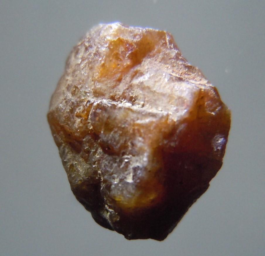 3.9 CT ZIRCON - UNTREATED GEMSTONE: No Reserve! Title: 3.9 CT ZIRCON - UNTREATED GEMSTONE Origin: Baw Gaew, Ratanakiri, Cambodia Size: 0.99x0.73x0.47 cm / 0.78 gram Description: chocolade brown, translucent and naturally rounded zircon 