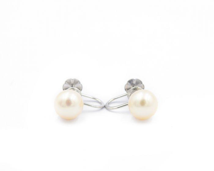 1960: Additional Information: 1960's Mikimoto White Gold and Pearl Earrings; 14k white gold; 1.7dwt/2.64g; 2 pearls = 8.00mm each : Item Number; 118744; Weight; 1.7000; Jewelry Type; Earrings; Jewelry Metal