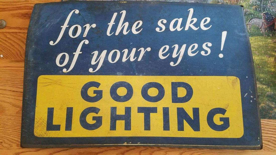 Good Lighting sign 1920's Industrial safety "for the: Great looking piece in very good condition. Has a warping to it. It will flatten be slight bend. Could be cleaned. Dates to 1930's. Measures 13 x 21" Shipping: Domestic: Flat-rate of $17.00 to anywher