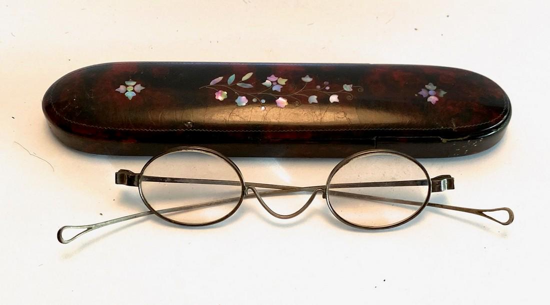 19th Sewing Glasses in Laquered Case with Mother of: Title: 19th Sewing Glasses in Laquered Case with Mother of Pearl Inlay Date: 1860 Dimension: 6" by 1.5" Provenance/Additional Info: Shipping: Domestic: Flat-rate of $10.00 to anywhere within the conti
