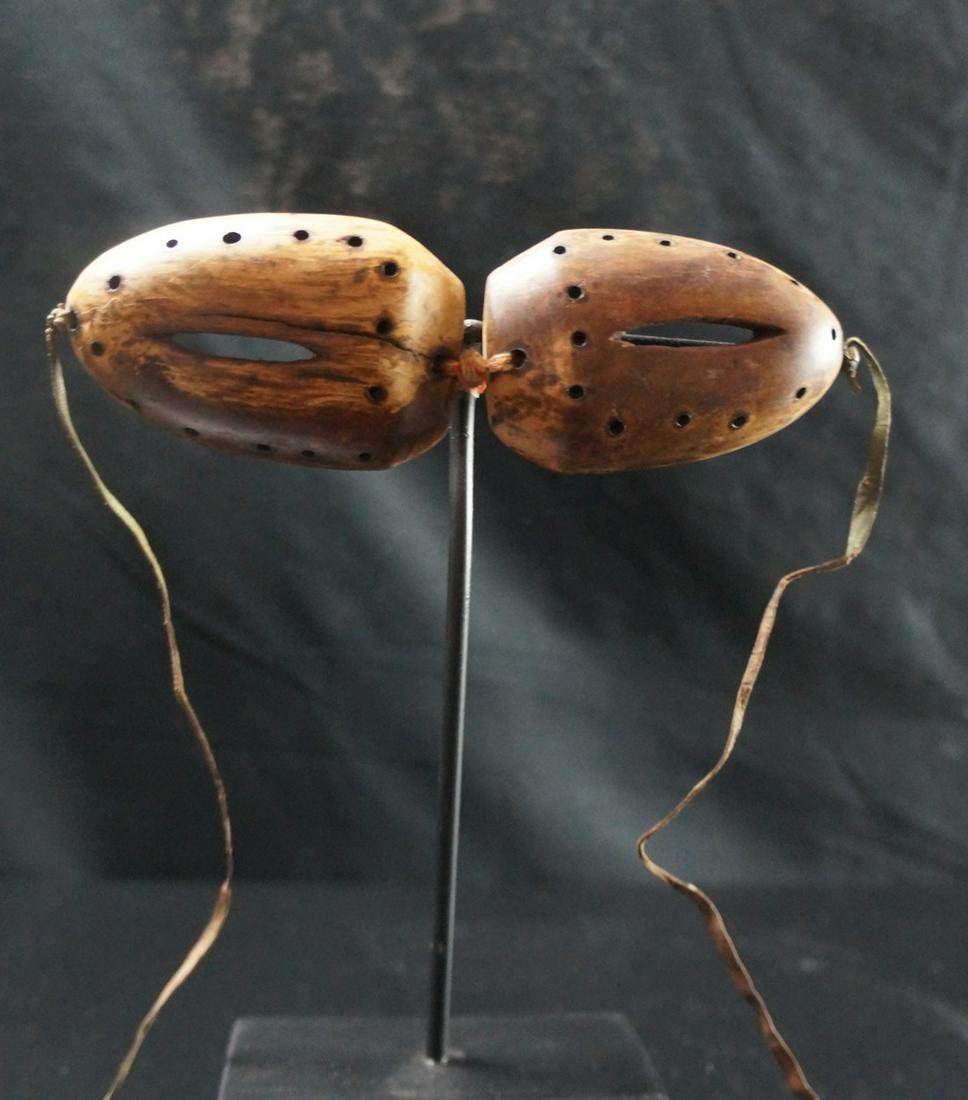 Vintage Alaskan Native Wooden INUIT Googles: Title: Vintage Alaskan Native Wooden INUIT Googles Origin: Alaska Date/Period: 1970/80s Materials: Wood, pigments, leather laces, textile fiber twine in the middle Size: 6.3 inches large - 34 grams De
