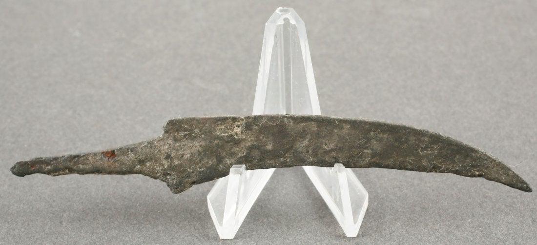 CELTIC SIDE KNIFE OR POUCH KNIFE 450-100 BC: 4 1/8 total length. Forged iron with the characteristic curved back wedge section blade. They are slashing knives capable of cutting a man’s throat to the spine. As with the Vikings after them, it i