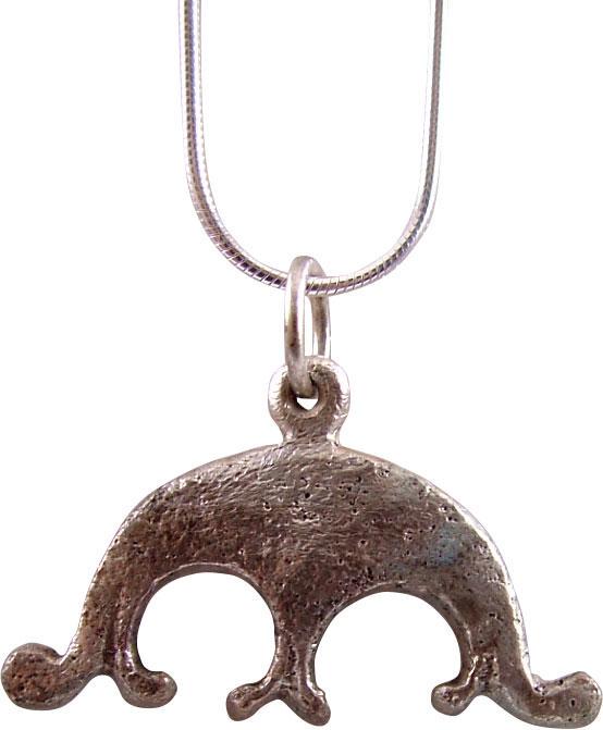 ANCIENT VIKING LUNAR PENDANT NECKLACE C.870-1050 AD: Cambridgeshire, England. Silvered bronze. As expert navigators, the constellations signified mystery and power to Vikings. Lunar pendants were worn as pectorals as well as suspended from belts, other 