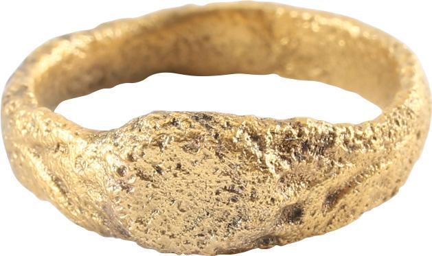 MEDIEVAL EUROPEAN GIRL’S’S RING. C.1400-1500.: Small size 3/12 , broad rounded band flaring to the shoulder. Raised oval bezel cut with a lattice and flanked by relief foliate designs. Surface textured from burial. Professionally refurbished with 
