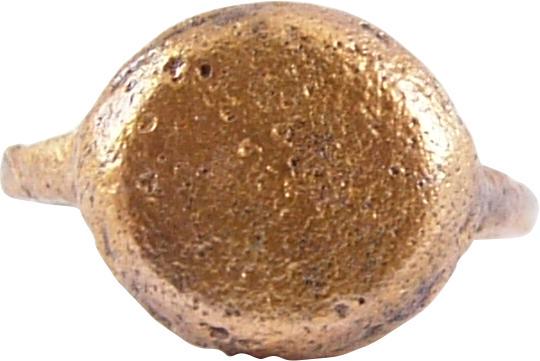 ANCIENT VIKING BOY’S RING C.950-1050 AD JEWELRY: Gilt bronze, size 2 ½ with well rounded 1.7mm band supporting a truncated cone form resulting in a large domed bezel. That form is a smaller version of the rings worn by warriors and this ring probab