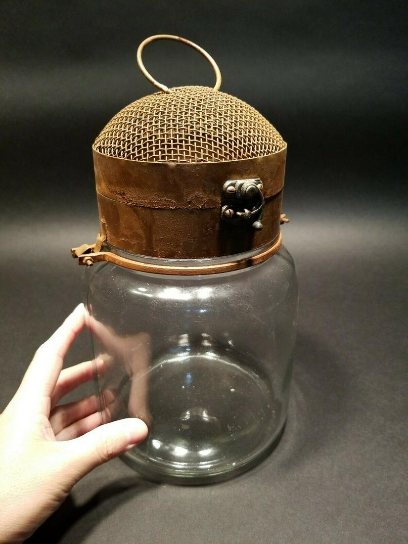 Iron & Glass Firefly Lightning Bug Jar Cage trap: 10 1/2" High jar 6 1/5" Wide Great reproduction of a firefly jar. As you can see the heavy glass jar has a metal top with a mesh lid. The lid unlatches and opens Please see also the images.. Reserve: 
