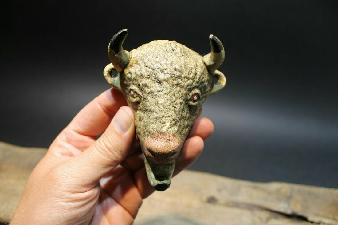 Cast Iron Folk Art Beer Soda Bottle Buffalo Opener: 4" Tall x 3 3/8" Wide Such a neat reproduction of an antique cast iron buffalo bottle opener. This opener is all cast iron, cast from an antique, hand painted, and lightly distressed to look old. It i