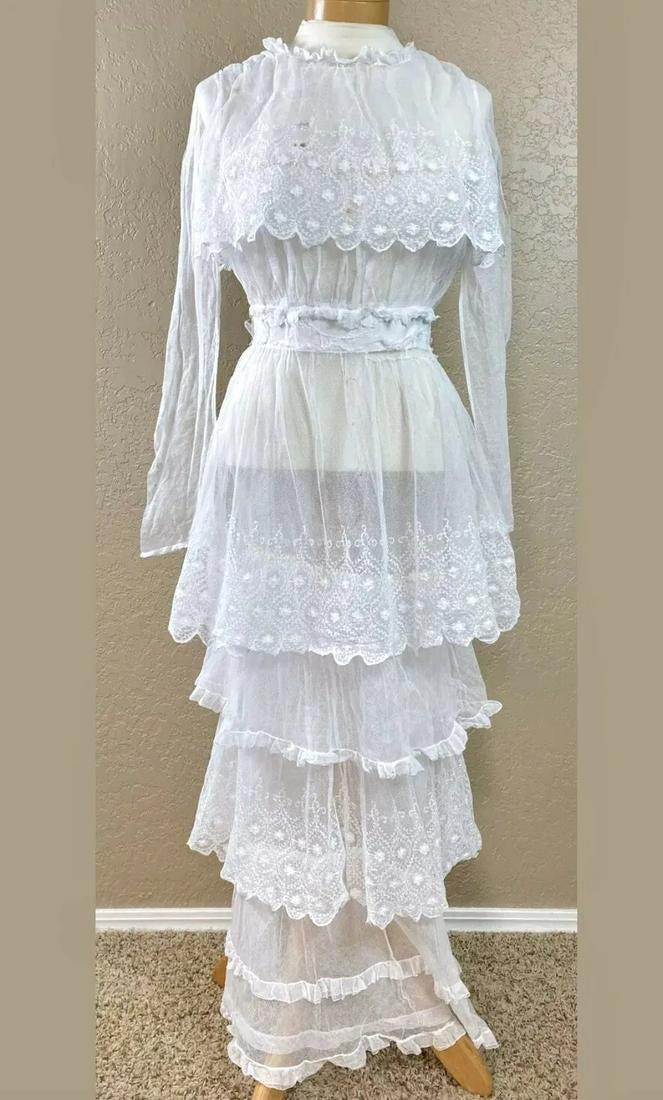 Antique Edwardian 1910 Ruffled Tea dress sheer floral: Delicate made of sheer netting with beautiful floral hand embroidered Stitching throughout Gorgeous Bell sleeves Small spots along the hook and eye and some at bodice but can be cleaned, I will try to