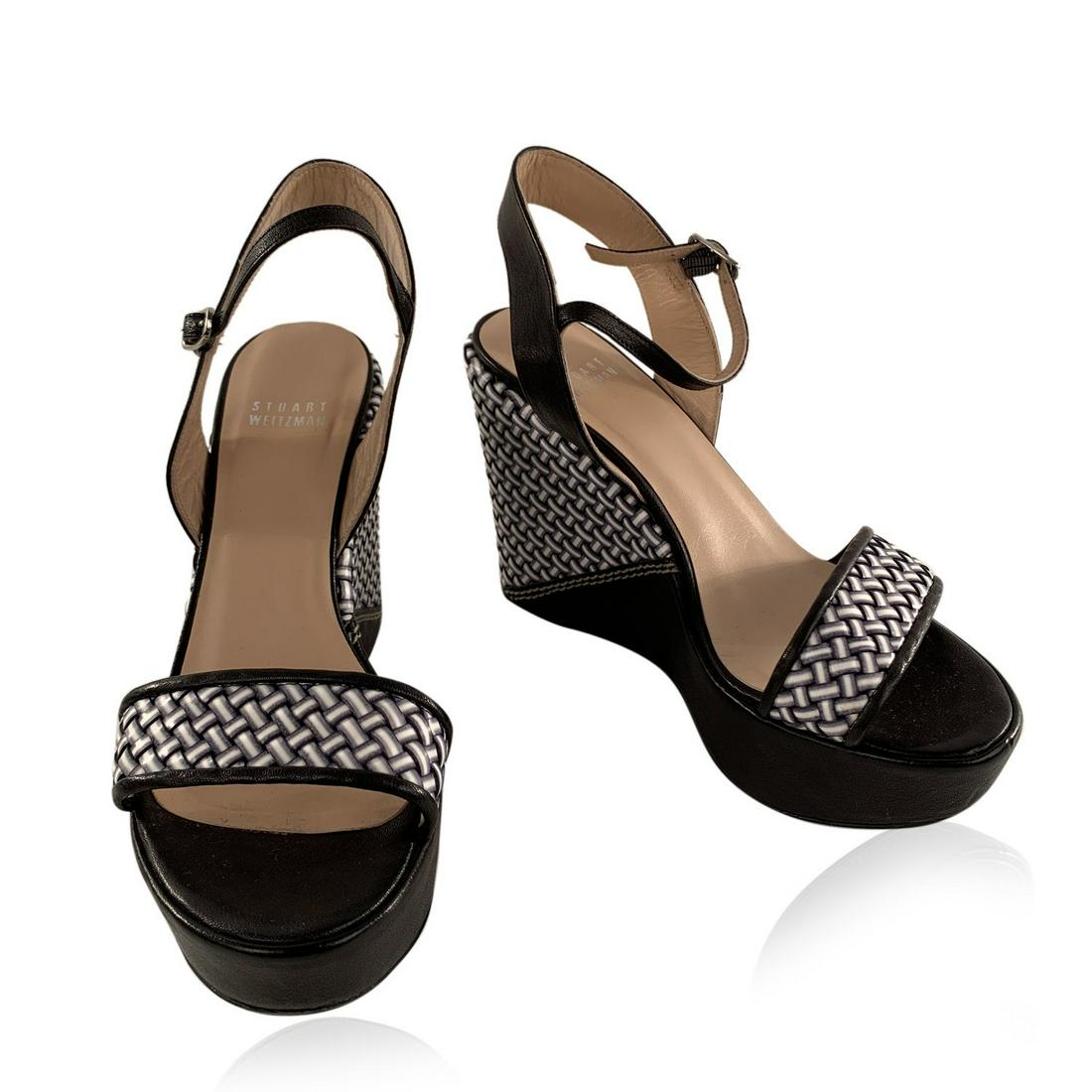 Stuart Weitzman Black Holiday Pipe Woven Wedge Shoes: Stuart Weitzman 'Holiday Pipe' black and white woven wedges. Open toe. Ankle strap and woven toe strap. Size 38.5. Genuine leather. 1.5 inches - 38 cm Platform. Heels height: 5 inches - 127 cm. Stuart