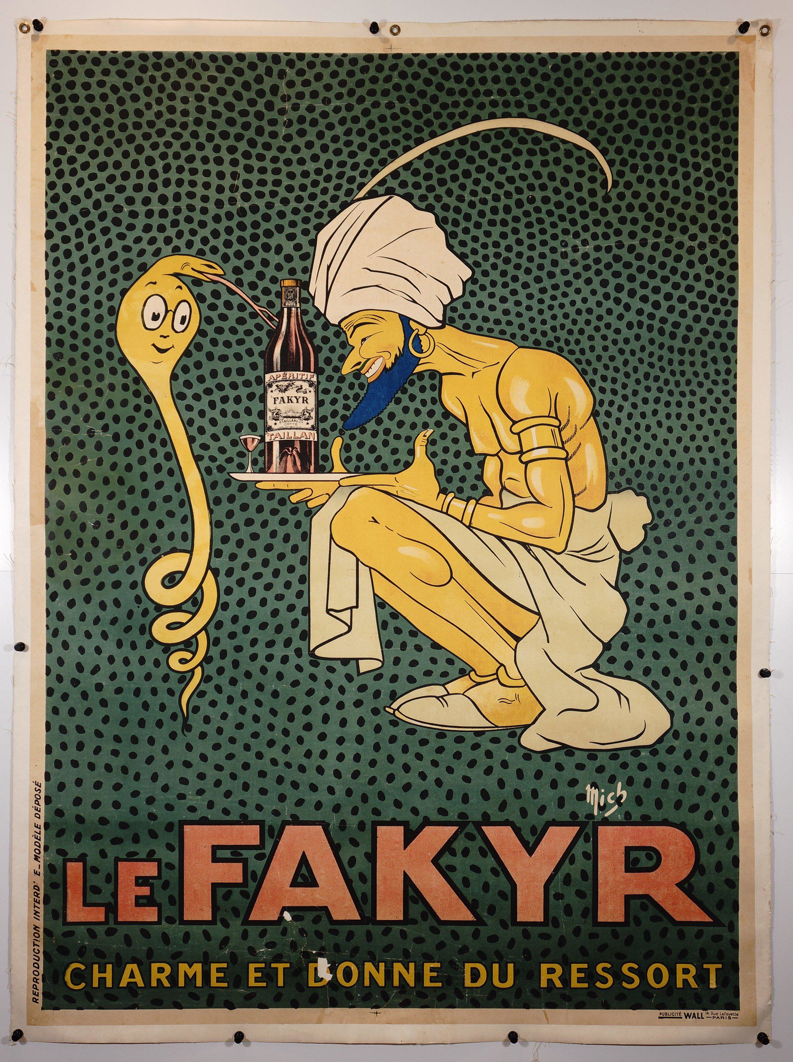 Le Fakyr (1921): Fantastic vintage poster by MICH (Michel Liebeaux, 1881-1923), featuring a snake charmer serving up some delicious Le Fakyr aperitif. Size: 62.5 x 46.25" Condition. Fair. There is some fading througho