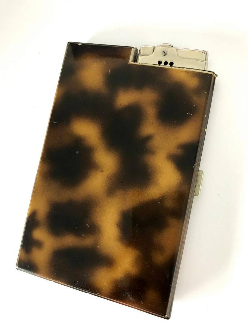 Vintage OMEGA portsigar cigarette case lighter 13x9 cm: Title: Vintage OMEGA portsigar cigarette case lighter 13x9 cm Maker: Origin: Japan Date/Period: XXc. Materials:stainless steel Size:13x9cm, 144 grams Description:With '? omega' hallmark Reserve: $60.0
