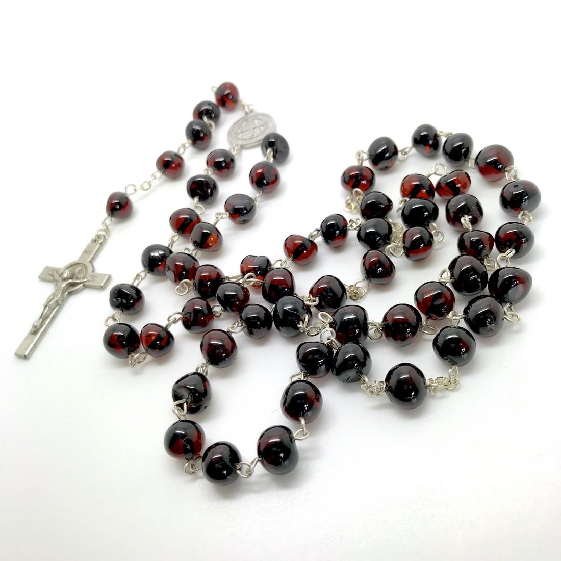 Vintage Catholic rosary with Baltic amber beads: Title: Vintage Catholic rosary with Baltic amber beads Metal: None Gemstones: Amber Weight: 7.6 g Size: Bead size: 60.0 mm Bead size: 2.362 inches Made of: Whole Stone Additional Information: Amber do