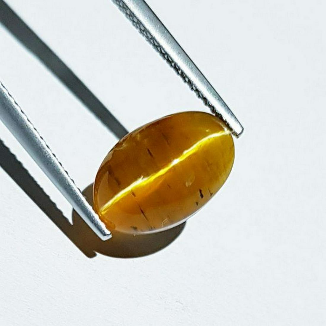 4.35 ct Natural Opal Cat's Eye Oval Cut: No Reserve! Title: 4.35 ct Natural Opal Cat's Eye Oval Cut Color/Clarity: Semi Transparent Gemstones: Loosegemstone Carat Weights:4.38 Size/Dimensions:12.50 x 8.30 x 7.50 Additional Info:Oval - Africa