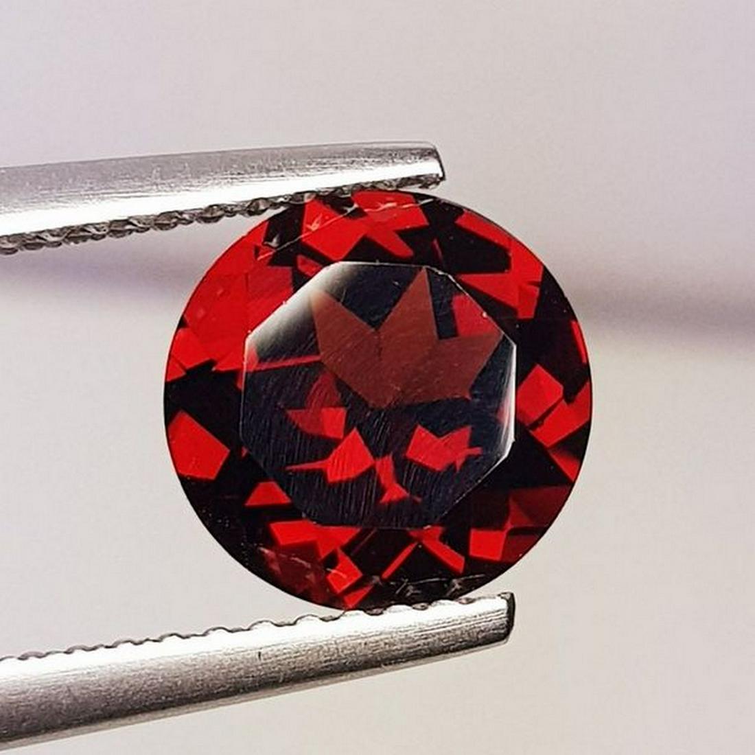 Natural Rhodolite Garnet Round Cut 2.10 ct: No Reserve! Title: Natural Rhodolite Garnet Round Cut 2.10 ct Color/Clarity: VVS - VS Gemstones: Gemstones Carat Weights:2.1 Size/Dimensions:8.00 x 8.00 x 4.30 Additional Info:Round - Burma Shipping: 