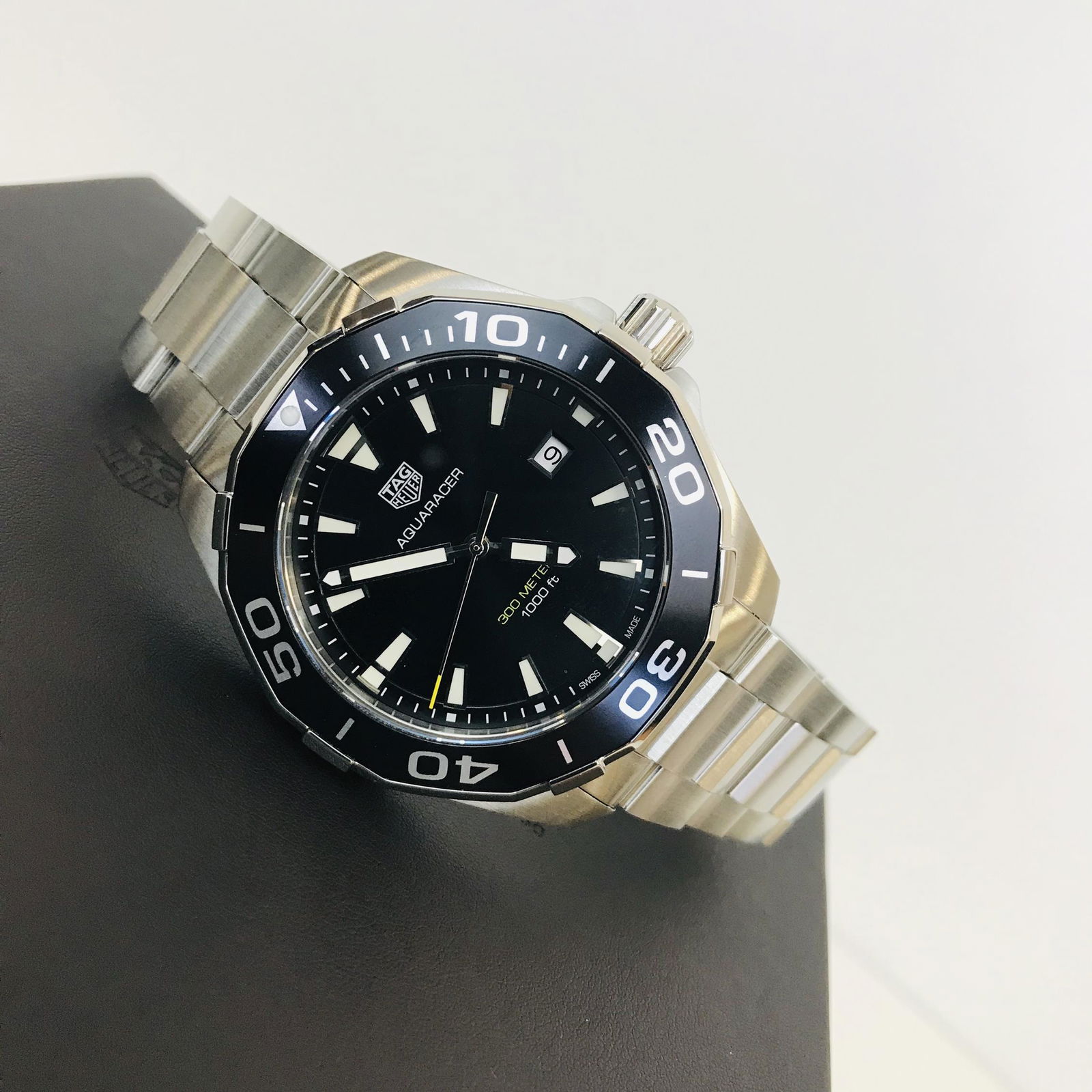 TAG Heuer Aquaracer 300 Quartz Watch: Title: TAG Heuer Aquaracer 300 Quartz Watch Brand: TAG Heuer Size/Dimensions: Case size: 43 mm Bracelet Length: Standard 184mm-197mm Movement Type: Quartz (Swiss Made) Box/Papers: In Orignal Box, 12 m