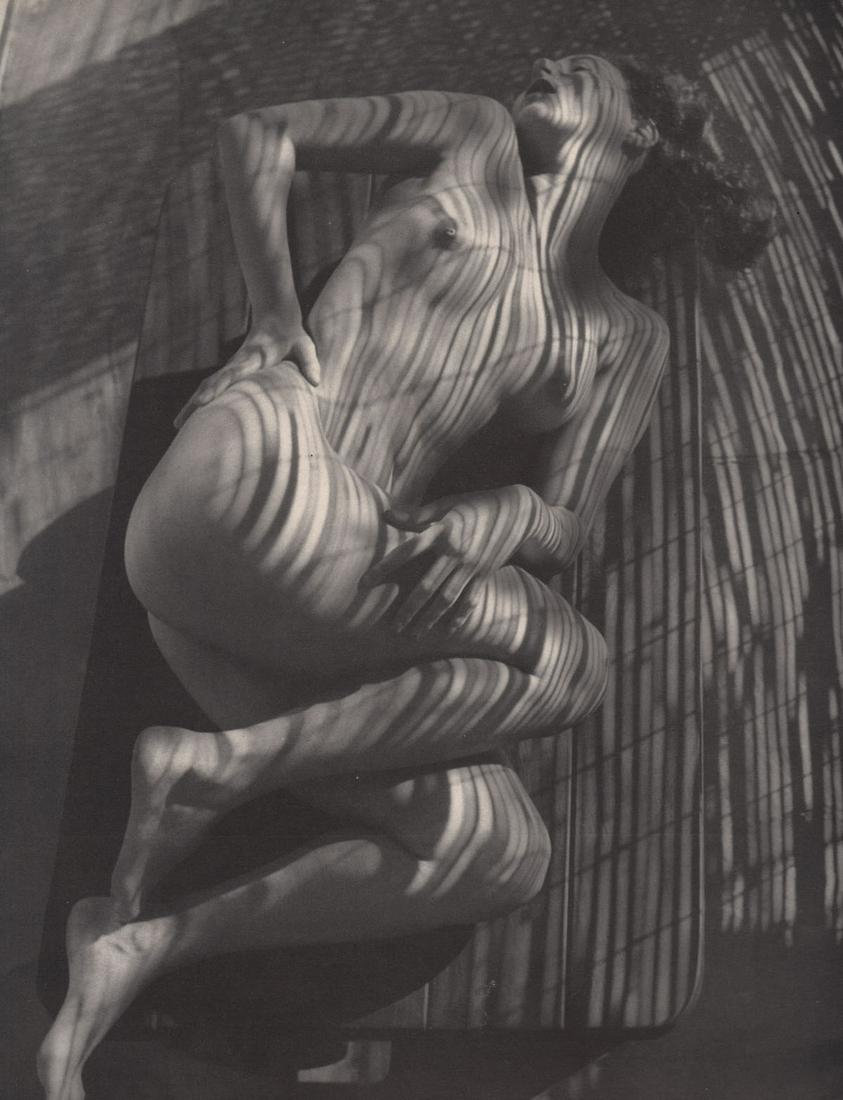 ANDRE DE DIENES - Nude with Shadows: Artist: ANDRE DE DIENES Print Title: Nude with Shadows Medium: Photoengraving Printed 1950’s in the UK Image size (inches) approx. 10.5 x 8.5” Andre De Dienes was a professional photographer, empl