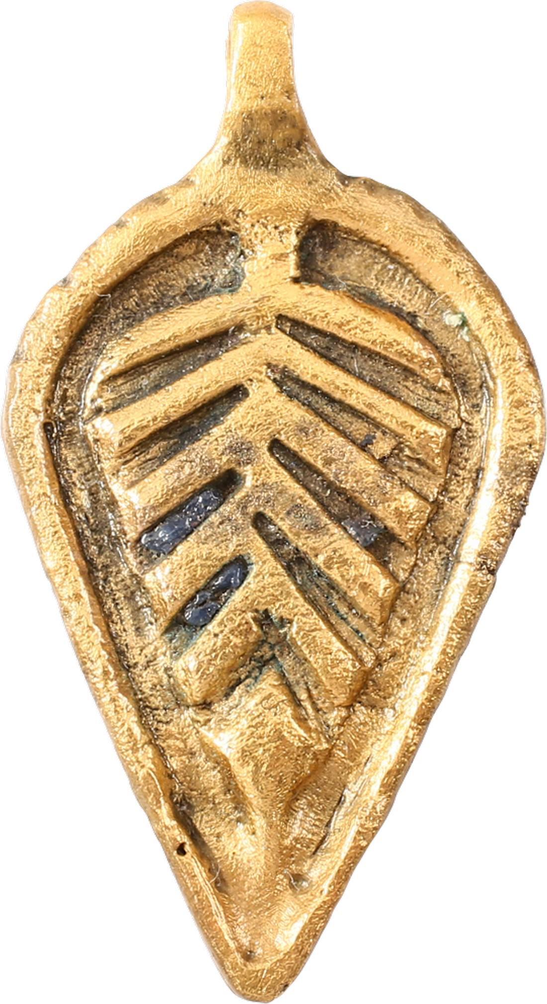 ANCIENT MEDIEVAL NOBLE WOMAN'S NECKLACE PENDANT: Gilt bronze. Shield shaped, specifically as a horseman’s or knights shield with substantial coverage at the top and tapering to lay along the horse’s girth. The center with a stylized pine motif. 