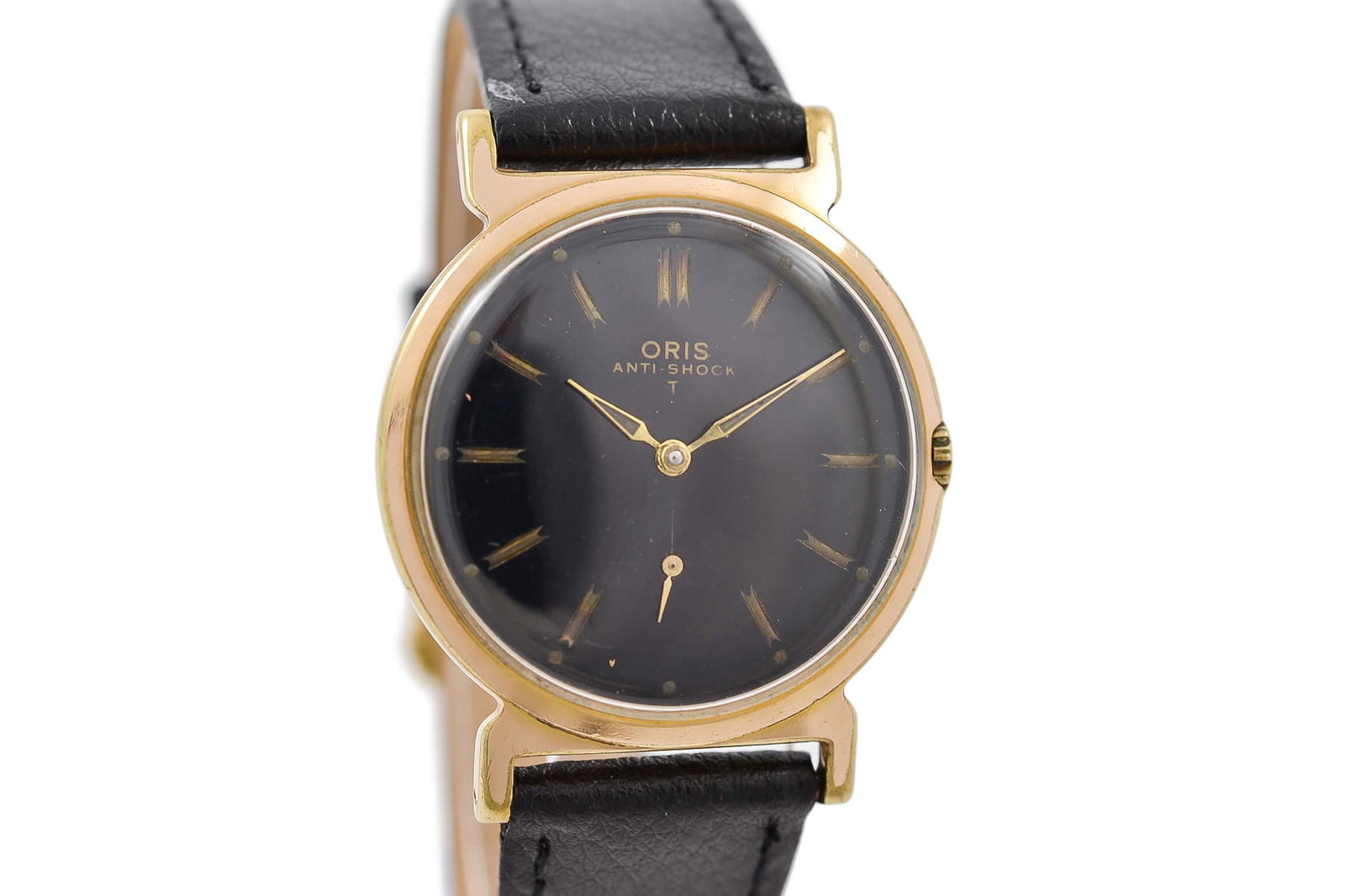 Oris Anti-Shock T Gold Plated Manual Wind Midsize Watch: Title: Oris Anti-Shock T Gold Plated Manual Wind Midsize Watch Brand: Oris Date: 1970s Model: Anti-Shock T Movement: Manual Wind Functions: Time Case Metal: Gold Plated Case Size: 32mm X 40mm Diamonds