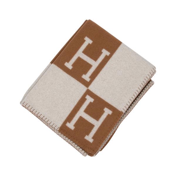 Hermes Blanket Avalon III Signature H Camel and Ecru: Guaranteed authentic Hermes classic Avalon III signature H blanket Ecru and Camel. Created from 90% Merino Wool and 10% cashmere and has whip stitch edges. Comes with signature Hermes box. New or Pris