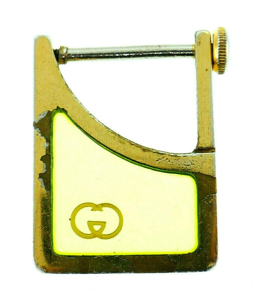 Vintage GUCCI Keychain: NS T0 Vintage collectible GUCCI Keychain Made of metal and color glass, features Gucci logo Stamped with the Gucci maker's mark and a hallmark for the country of origin (Italy) Measurements: 3/8" H x