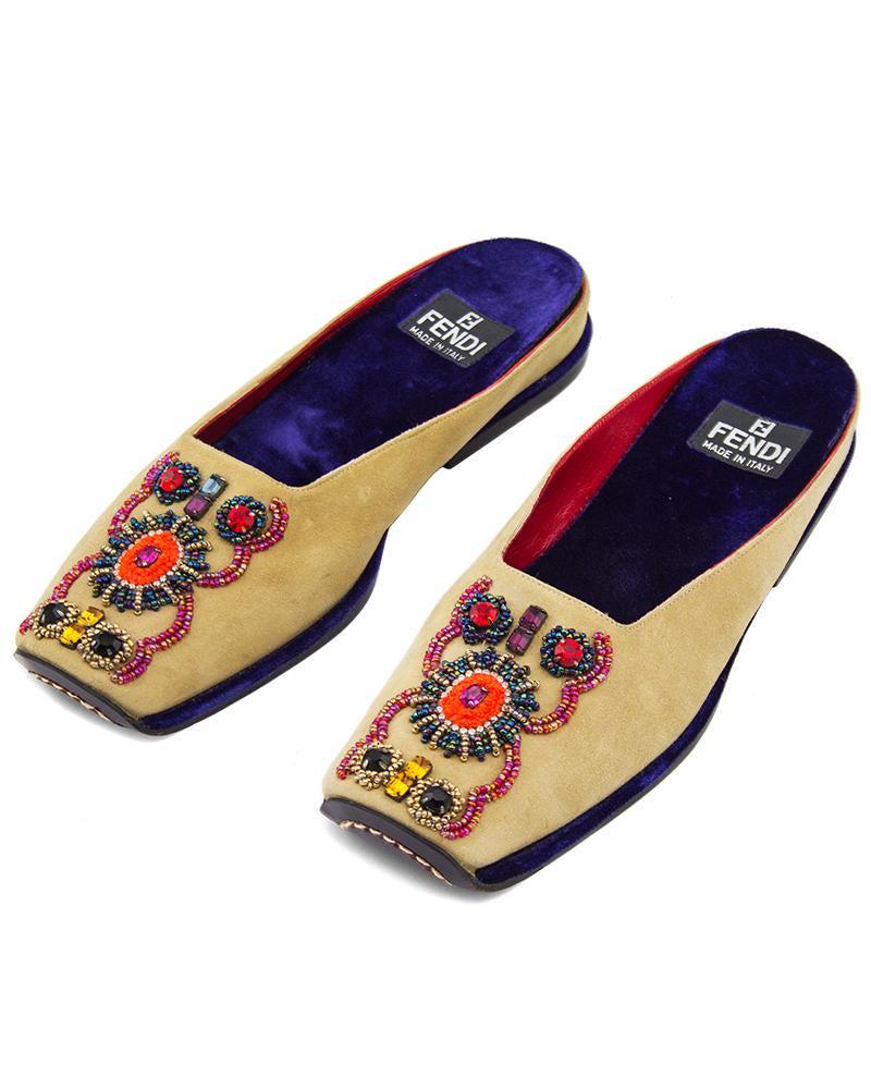 Fendi Beaded Suede Slipper Slides: Beautifully beaded light tan suede Fendi slipper slides from the mid 2000s. Inspired by traditional Indian Jootis style shoes, they have an intricately beaded toe design and purple velvet insoles and 