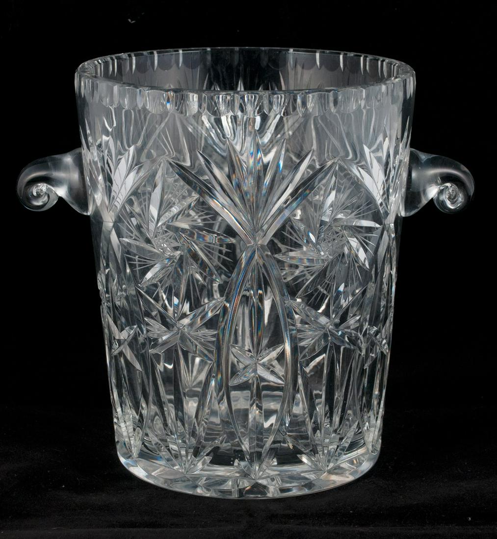 Double handle cut glass champagne cooler: Double handle cut glass champagne cooler with pinwheel design Reserve: $200.00 Shipping: Domestic: Flat-rate of $50.00 to anywhere within the contiguous U.S. International: Foreign shipping rates are 