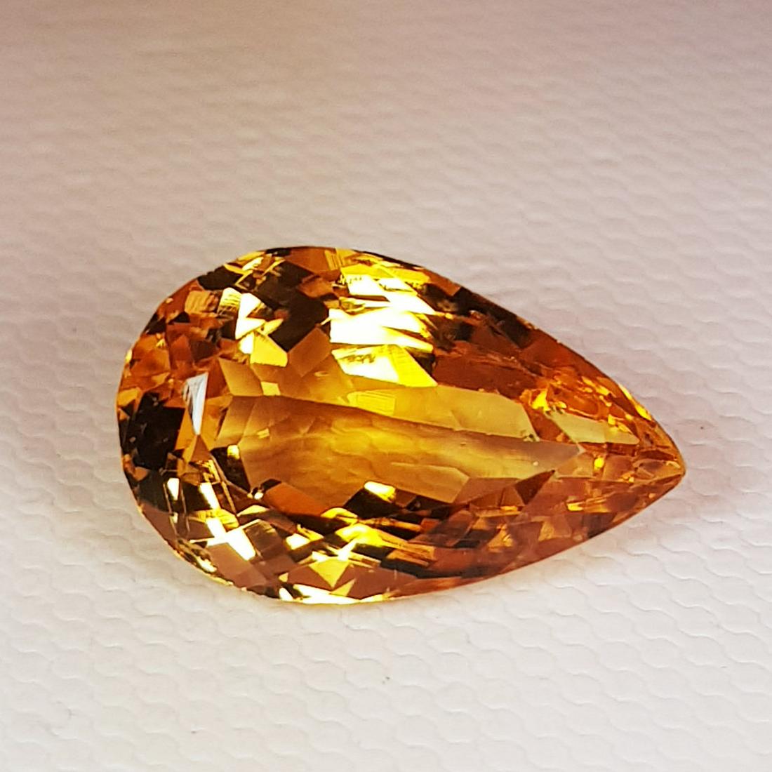 Natural Citrine Pear Cut 6.00 ct: Title: Natural Citrine Pear Cut 6.00 ct Stone: Citrine Type: IF - VVS Color/Clarity: Loosegemstone Carat Weight: $6 Dimensions: 15.00 x 9.30 x 7.60 Additional Information: Pear - Madeira Reserve: $10.