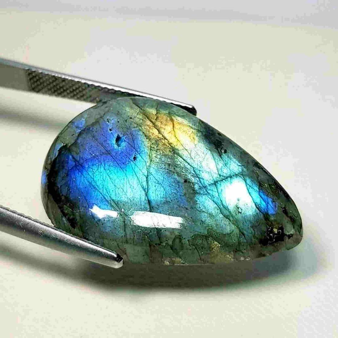 26.35 ct Natural Labradorite: No Reserve! Title: 26.35 ct Natural Labradorite Color/Clarity: Opaque Type: Gemstones Carat Weight: $26 Dimensions: 29.42 x 20.97 x 5.80 Additional Information: Pear - USA Shipping: Worldwide: Fla